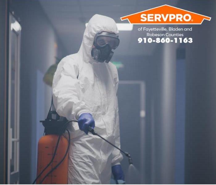 A commercial building is being deep cleaned and disinfected.